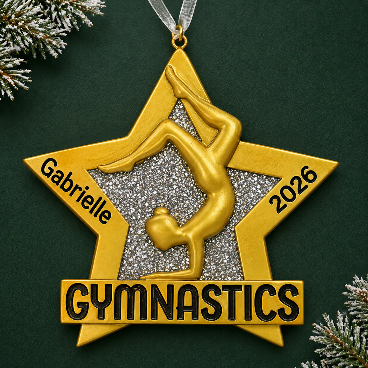 Personalized gymnastics gold star christmas ornament on a dark green pine background