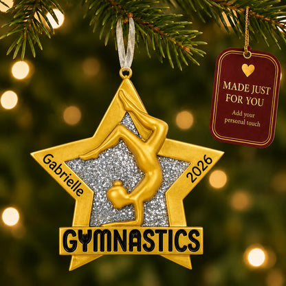 Gymnastics gold star christmas ornament hanging on a lit Christmas tree with a Made Just For You gift tag
