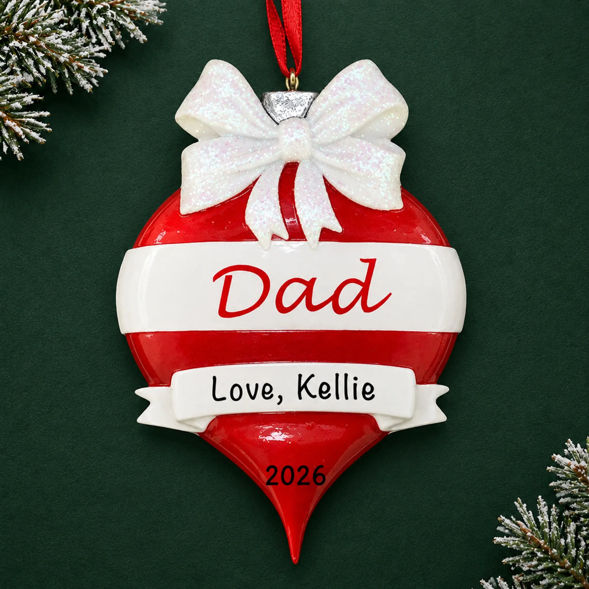Personalized dad red christmas ornament on a dark green pine background