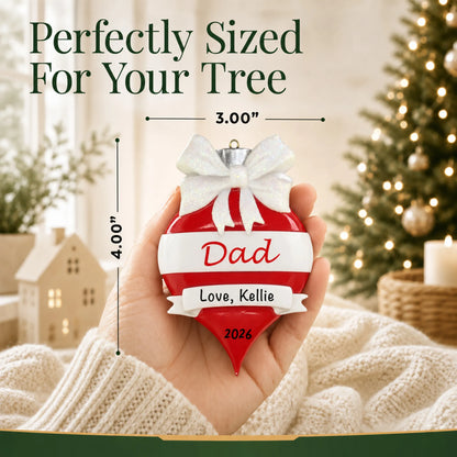 Size guide: the personalized dad red christmas ornament is 3.00 in wide by 4.00 in tall, shown in hand