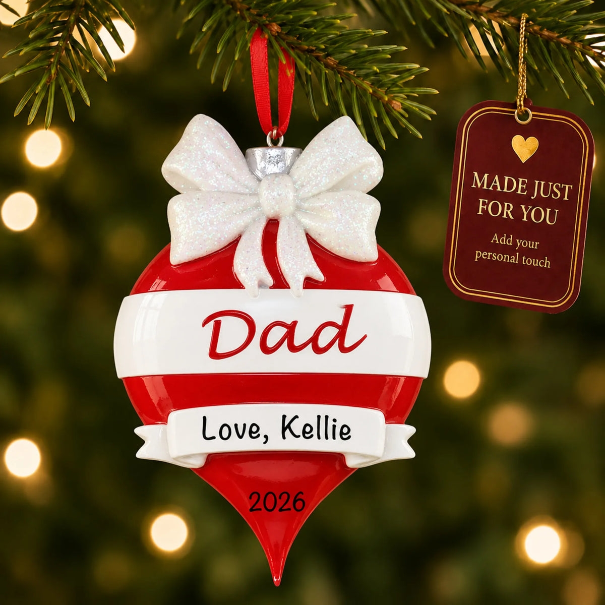 Dad red christmas ornament hanging on a lit Christmas tree with a Made Just For You gift tag