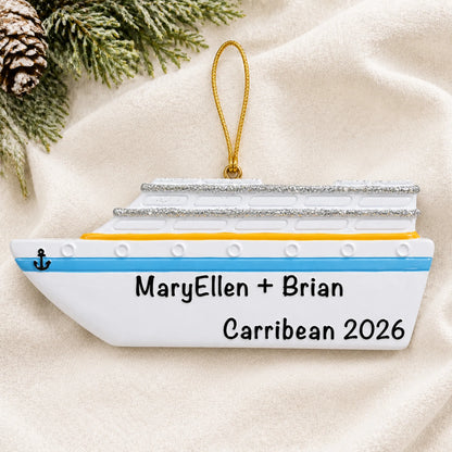 Personalized cruise ship christmas ornament laid on a soft white knit blanket