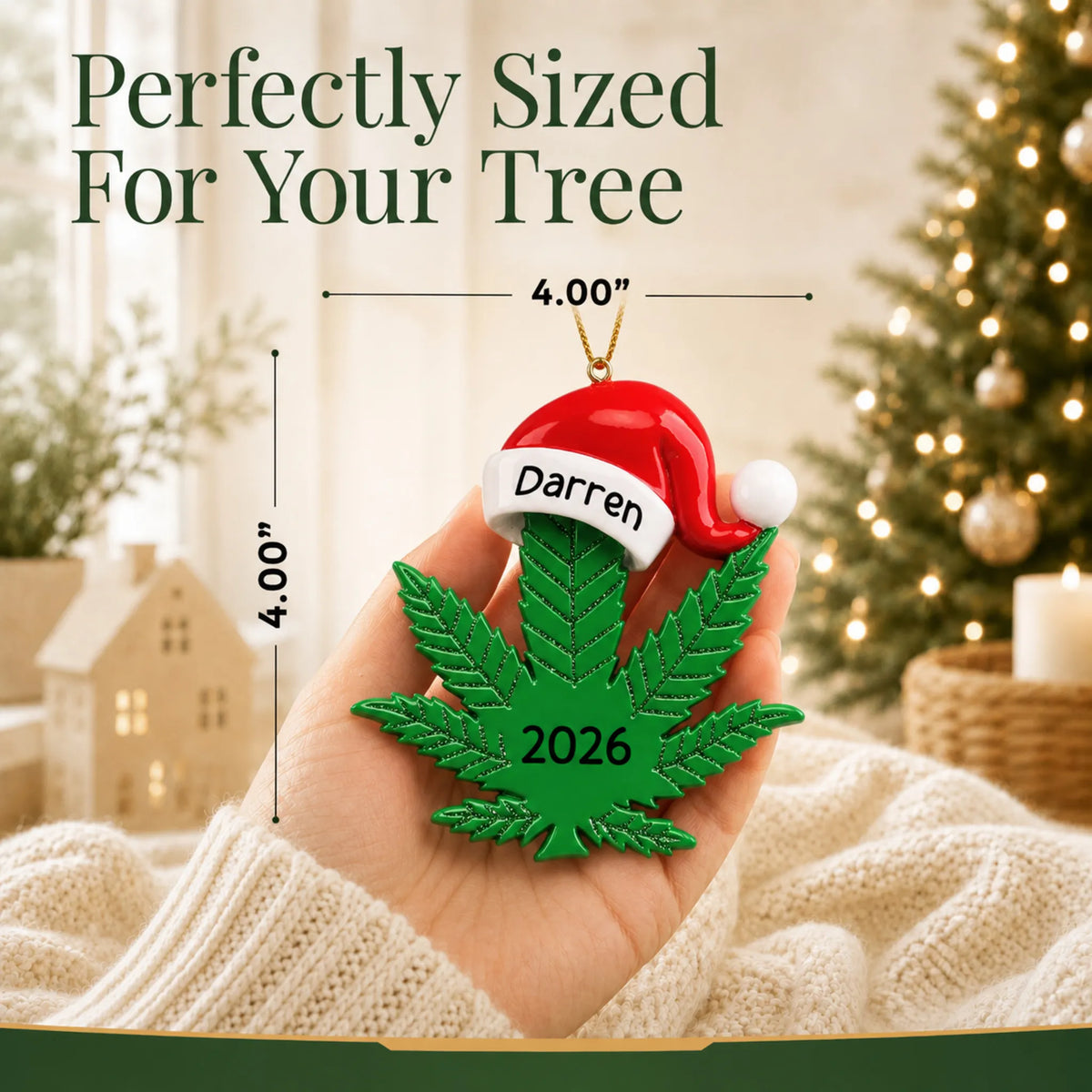 Size guide: the personalized cannabis leaf santa hat christmas ornament is 4.00 in wide by 4.00 in tall, shown in hand
