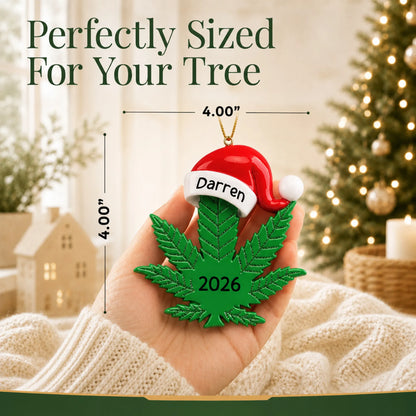 Size guide: the personalized cannabis leaf santa hat christmas ornament is 4.00 in wide by 4.00 in tall, shown in hand