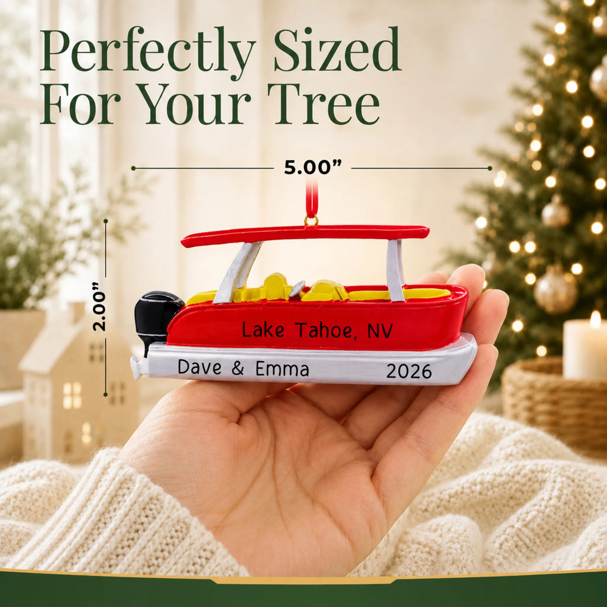 Size guide: the personalized red pontoon boat christmas ornament is 5.00 in wide by 2.00 in tall, shown in hand