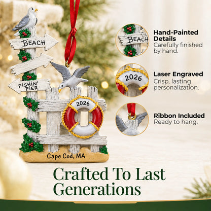 Hand-painted details and laser engraved personalization on the beach gate christmas ornament, ribbon included