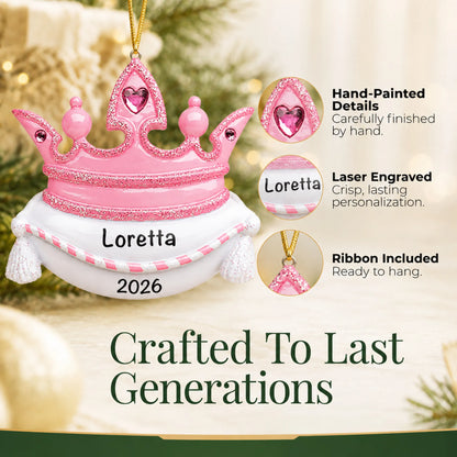Hand-painted details and laser engraved personalization on the pink princess crown christmas ornament, ribbon included