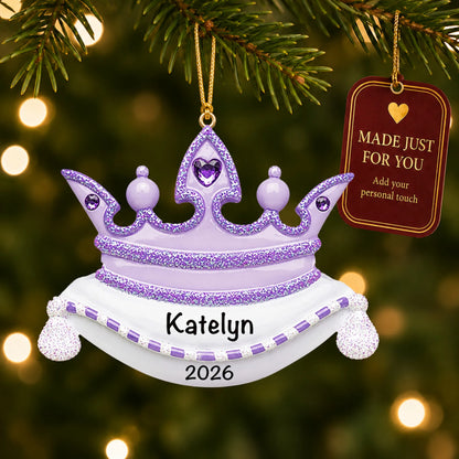 Purple princess crown christmas ornament hanging on a lit Christmas tree with a Made Just For You gift tag
