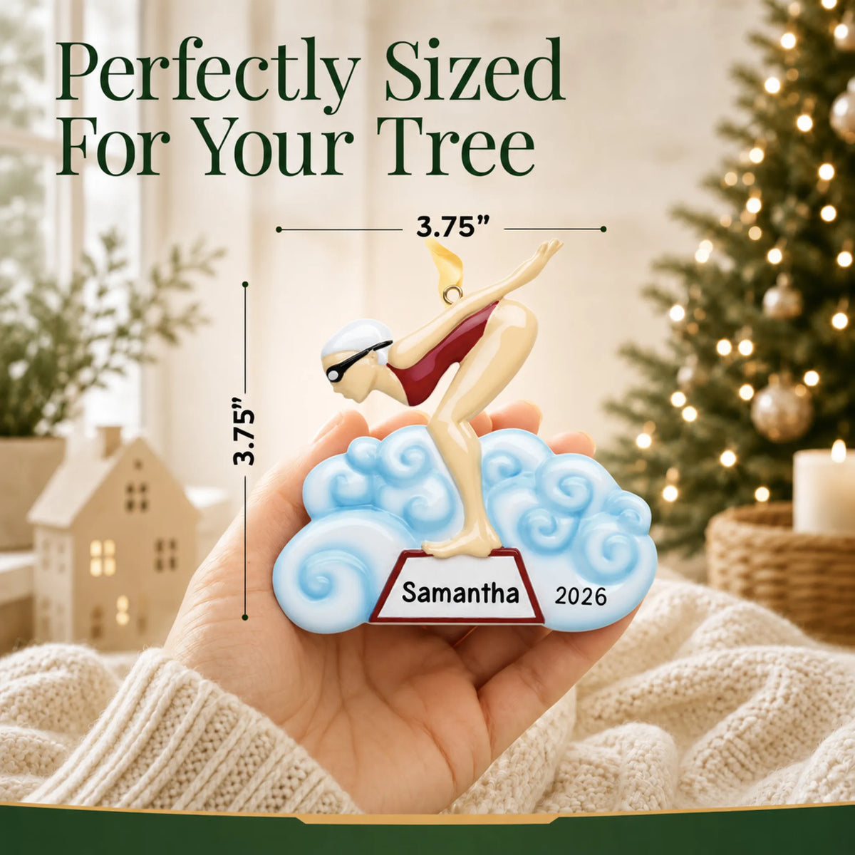 Size guide: the personalized girl swimmer christmas ornament shown in hand next to a Christmas tree
