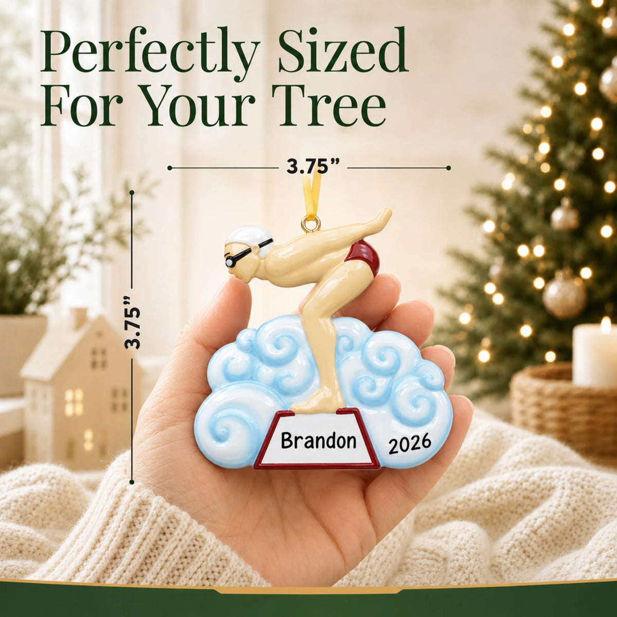 Size guide: the personalized boy swimmer christmas ornament is 3.75 in wide by 3.75 in tall, shown in hand