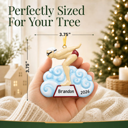 Size guide: the personalized boy swimmer christmas ornament is 3.75 in wide by 3.75 in tall, shown in hand