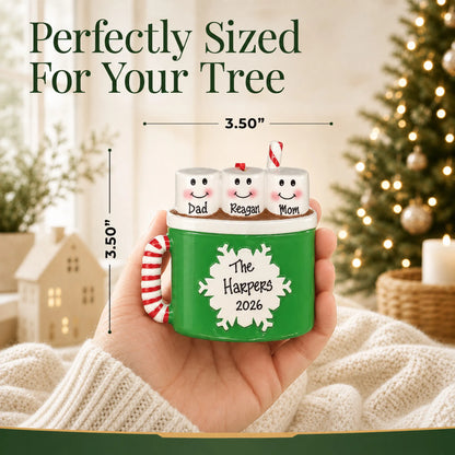 Size guide: the personalized hot cocoa family of 3 christmas ornament is 3.50 in wide by 3.50 in tall, shown in hand