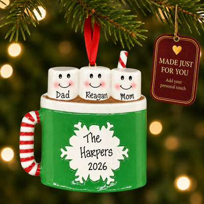 Hot cocoa family of 3 christmas ornament hanging on a lit Christmas tree with a Made Just For You gift tag