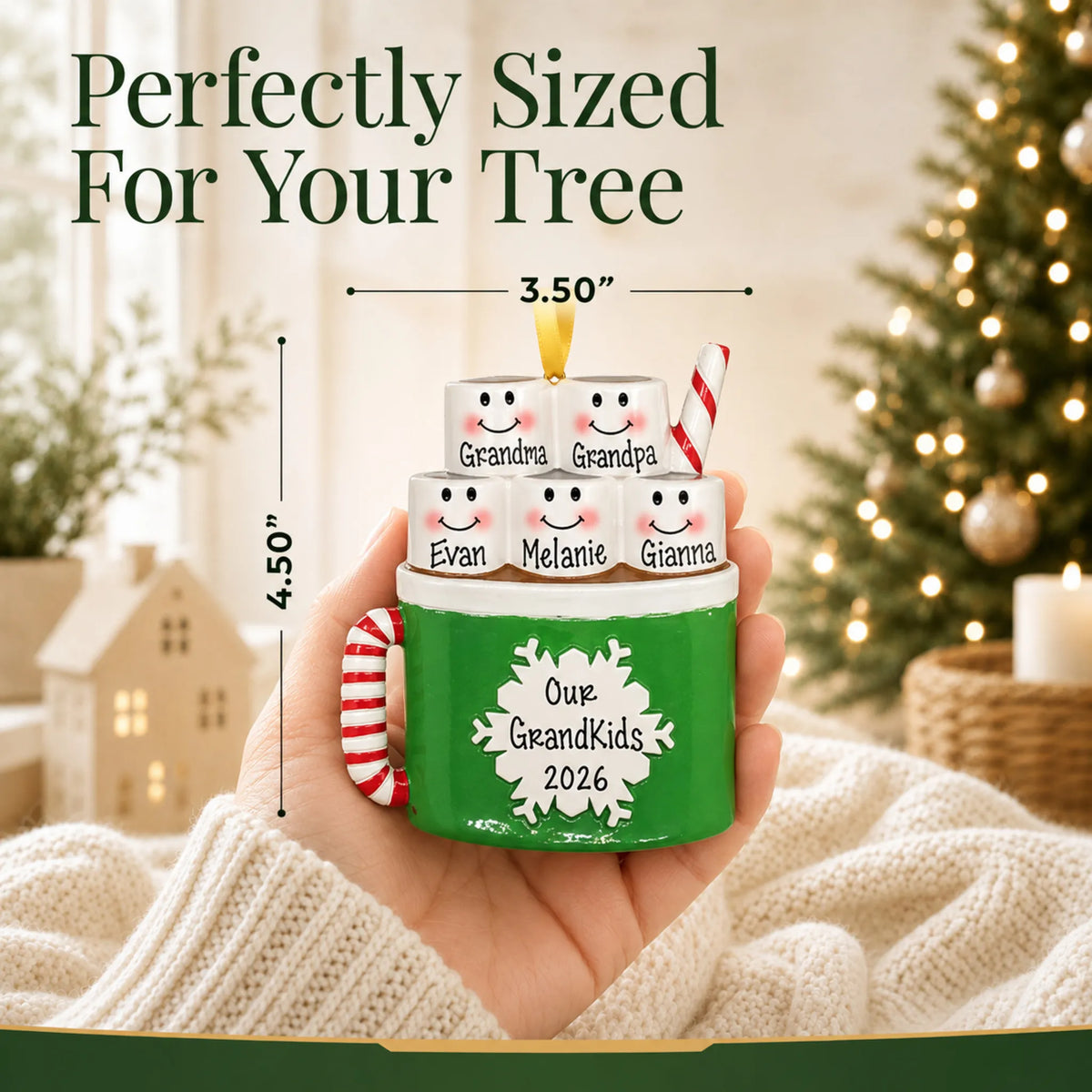 Size guide: the personalized hot cocoa family of 5 christmas ornament is 3.50 in wide by 4.50 in tall, shown in hand