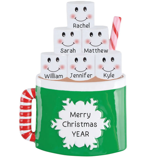 Green hot cocoa mug with candy cane handle and personalized name marshmallows on a white background