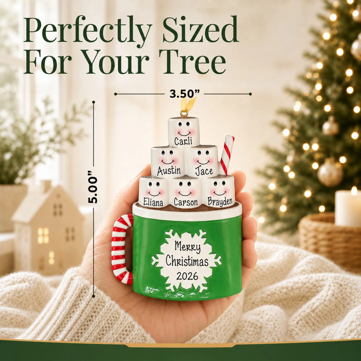 Size guide: the personalized hot cocoa family of 6 christmas ornament is 3.50 in wide by 5.00 in tall, shown in hand