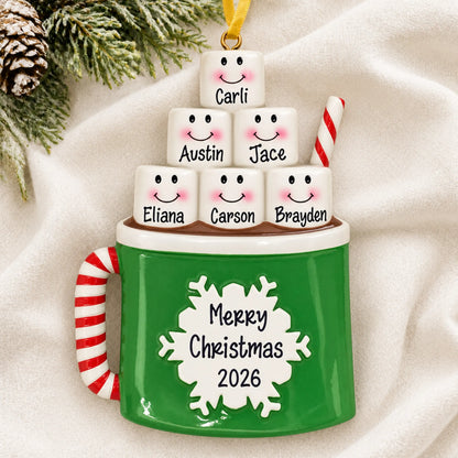 Personalized hot cocoa family of 6 christmas ornament laid on a soft white knit blanket