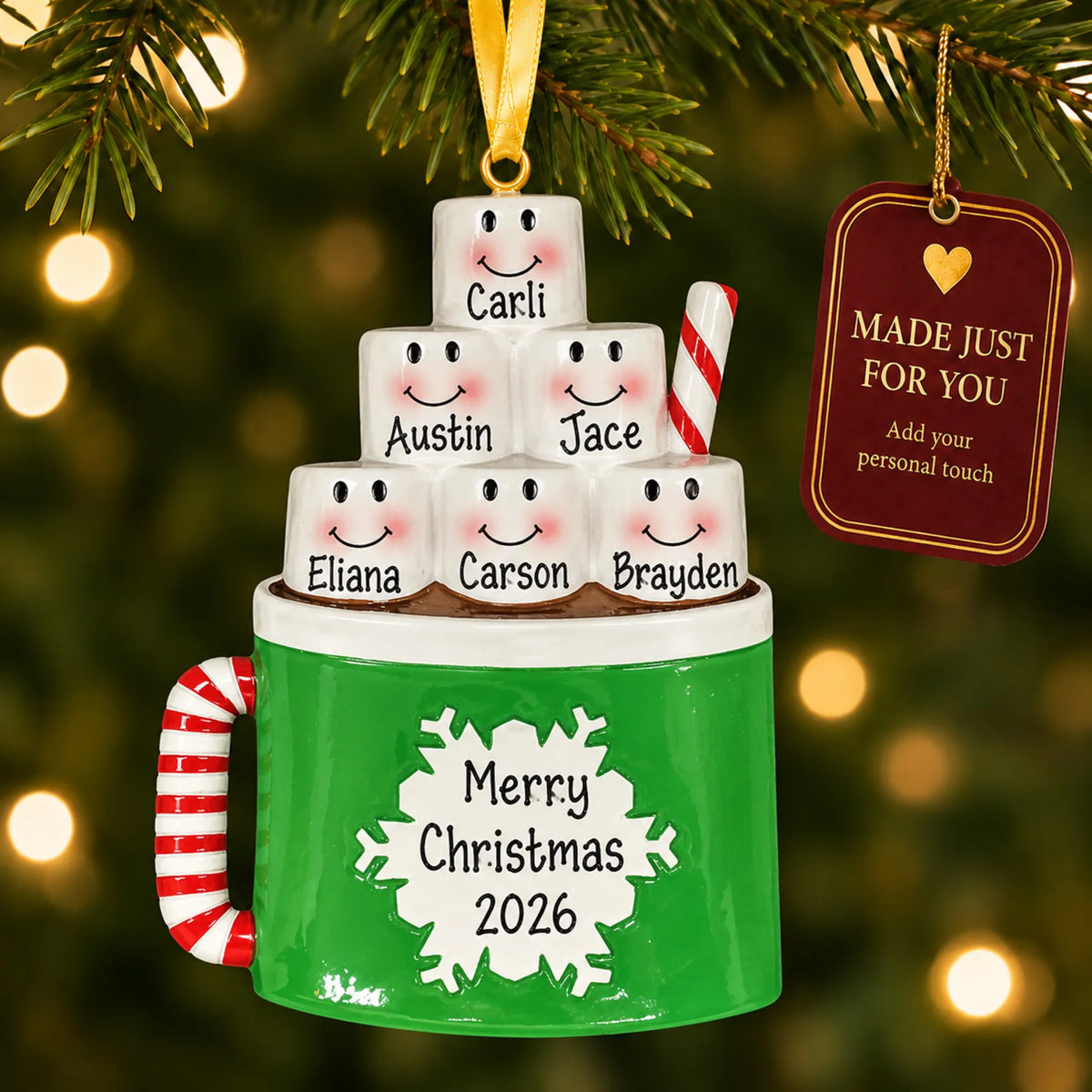 Hot cocoa family of 6 christmas ornament hanging on a lit Christmas tree with a Made Just For You gift tag
