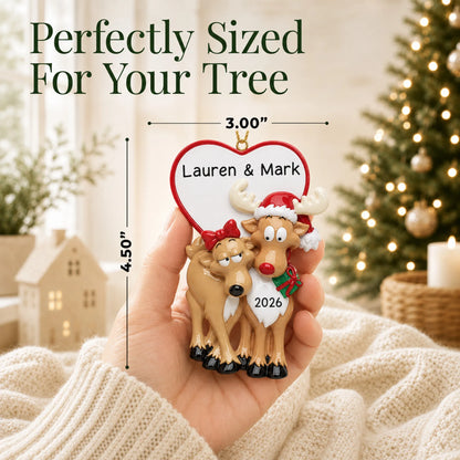 Size guide: the personalized reindeer couple christmas ornament is 3.00 in wide by 4.50 in tall, shown in hand