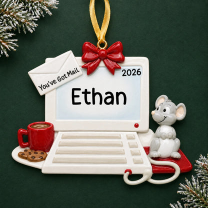 Personalized computer and mouse christmas ornament on a dark green pine background