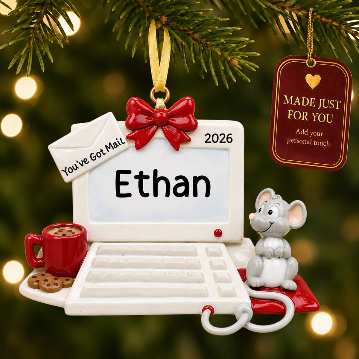 Computer and mouse christmas ornament hanging on a lit Christmas tree with a Made Just For You gift tag
