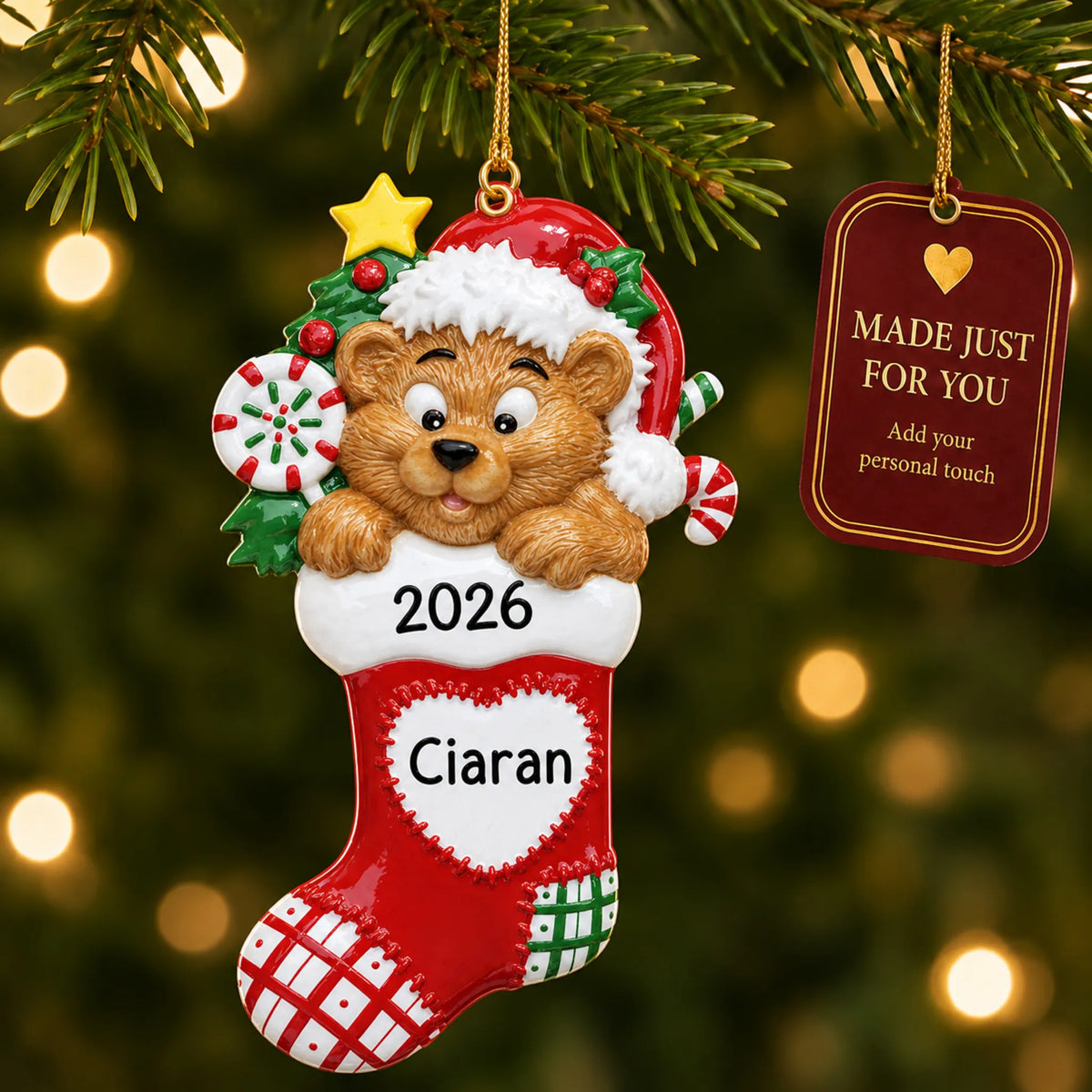 Bear Stocking christmas ornament hanging on a lit Christmas tree with a Made Just For You gift tag