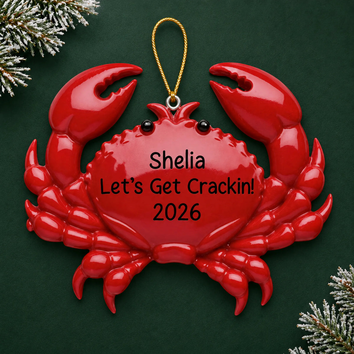 Personalized crab christmas ornament on a dark green pine background