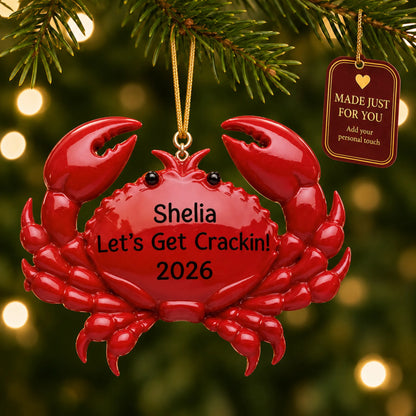 Crab christmas ornament hanging on a lit Christmas tree with a Made Just For You gift tag