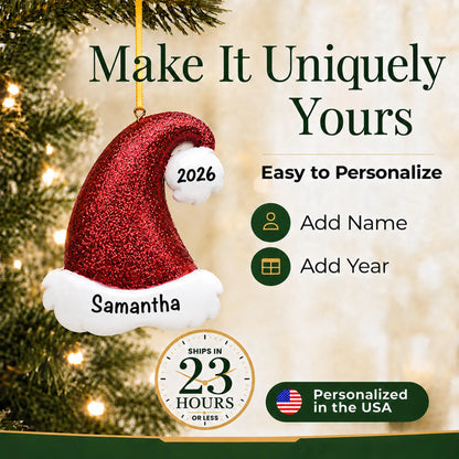 Make it yours: personalize the Santa Glitter Hat christmas ornament with a name and the year