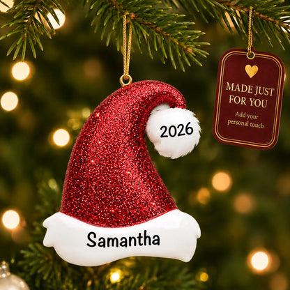 Santa Glitter Hat christmas ornament hanging on a lit Christmas tree with a Made Just For You gift tag