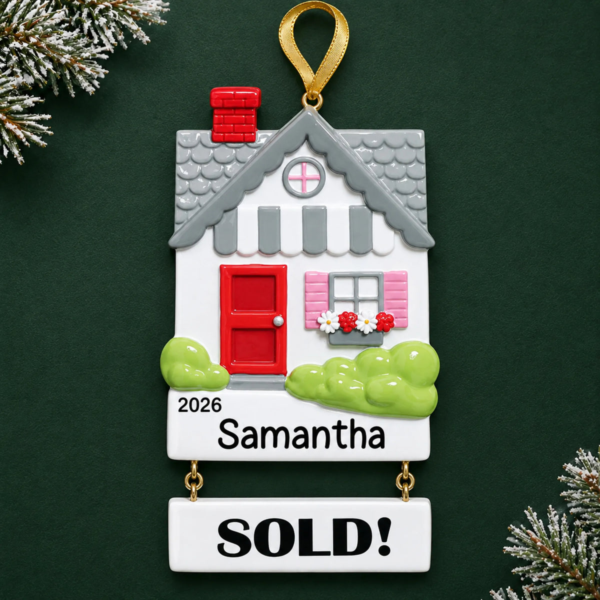 Personalized Real Estate Sold House christmas ornament on a dark green pine background