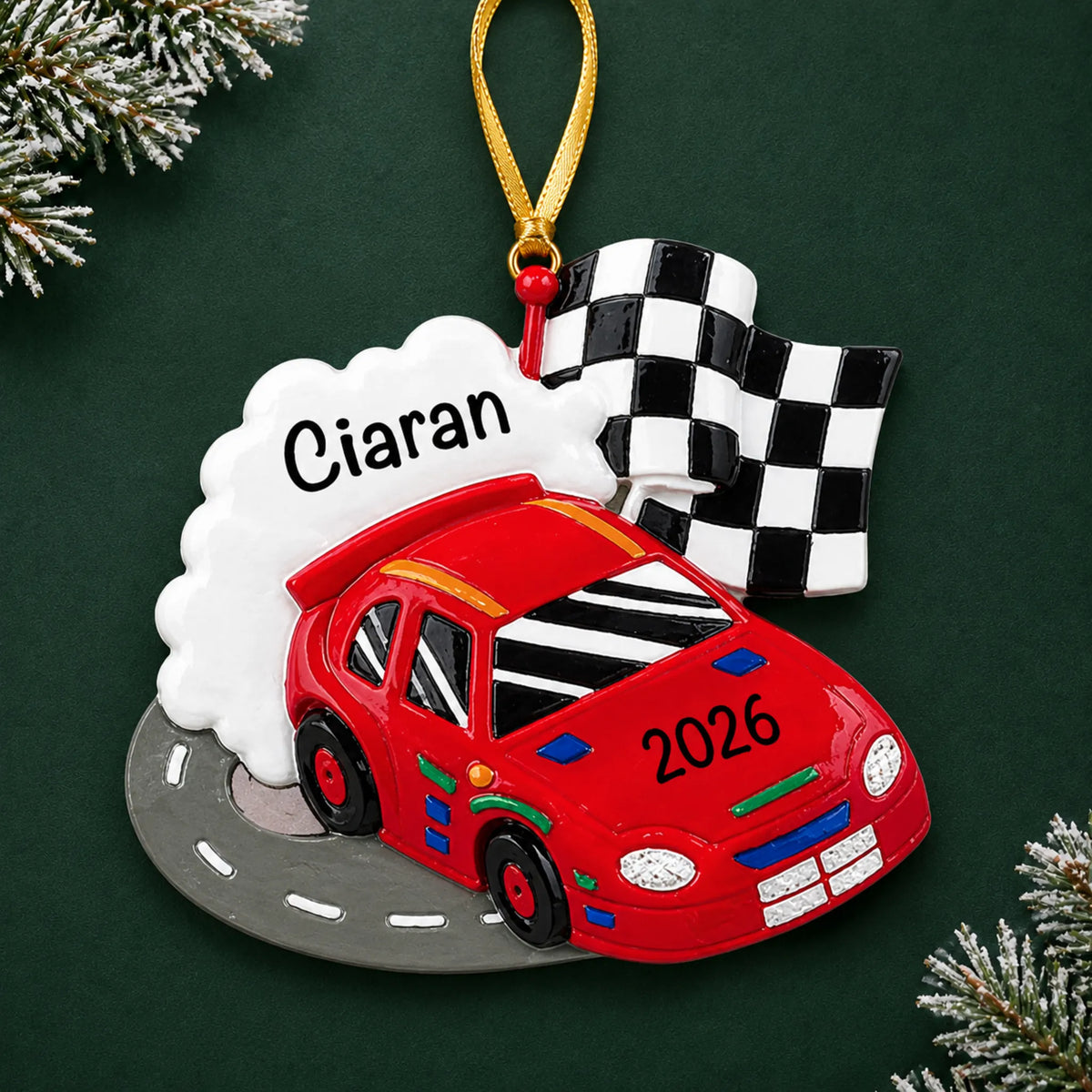 Personalized race car christmas ornament on a dark green pine background