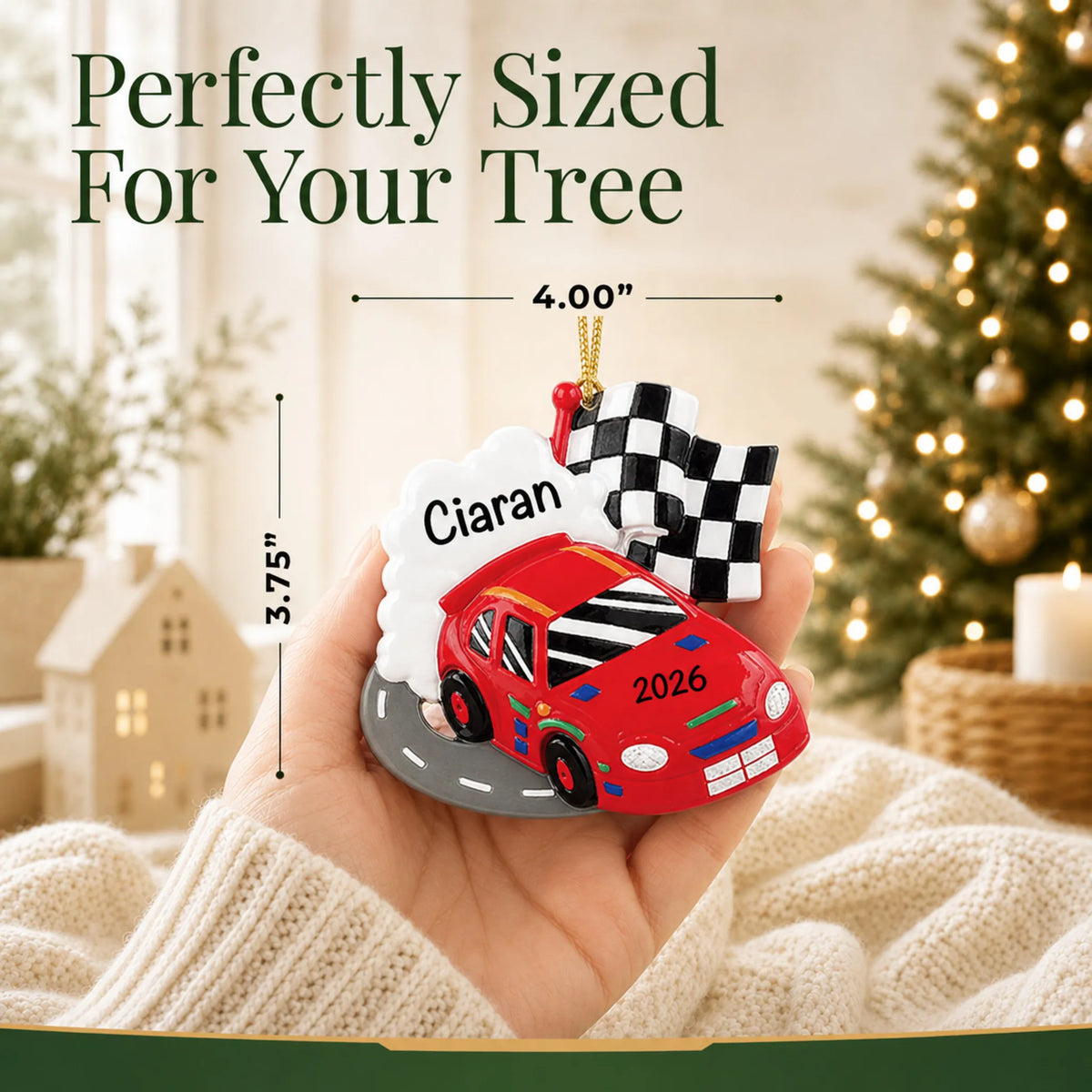 Size guide: the personalized race car christmas ornament is 4.00 in wide by 3.75 in tall, shown in hand