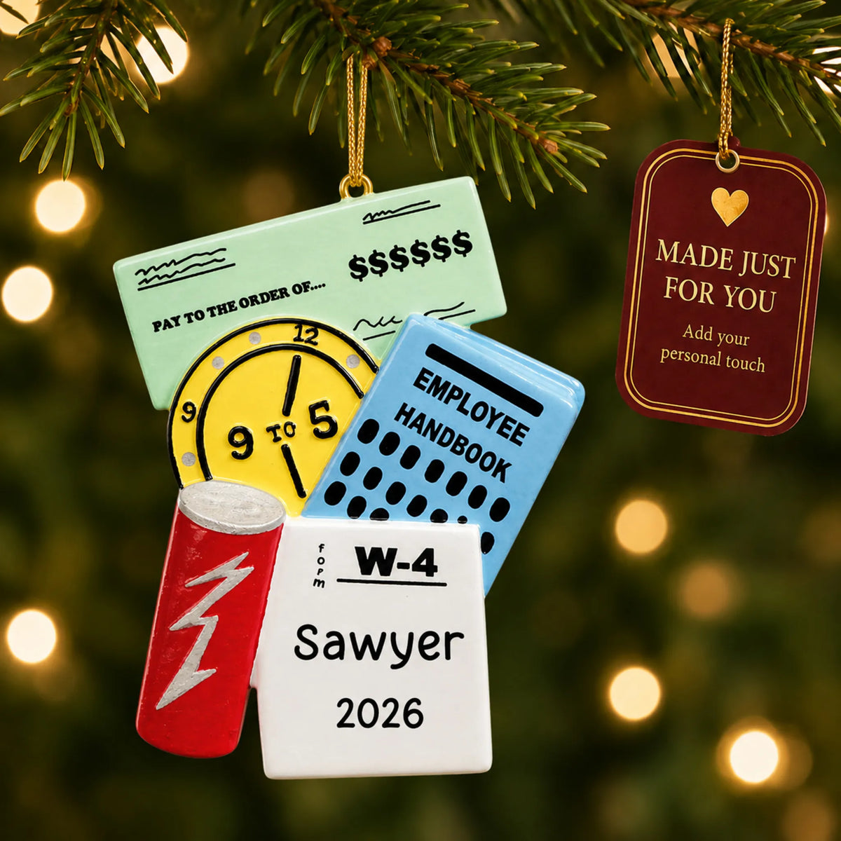 First job christmas ornament hanging on a lit Christmas tree with a Made Just For You gift tag