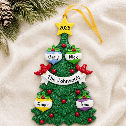 Personalized green glitter tree family of 4 christmas ornament with four names on a soft blanket