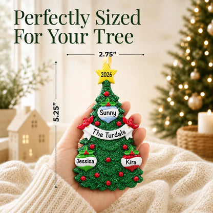 Size guide: the personalized green glitter tree family of 3 christmas ornament is 2.75 in wide by 5.25 in tall, shown in hand