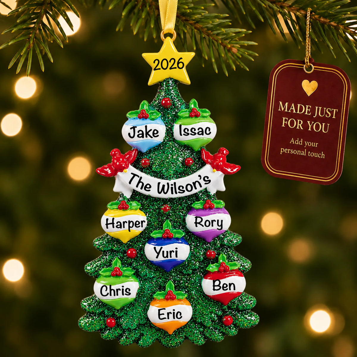 Green glitter tree family of 8 christmas ornament hanging on a lit Christmas tree with a Made Just For You gift tag