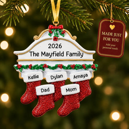 Red stockings family of 5 christmas ornament hanging on a lit Christmas tree with a Made Just For You gift tag