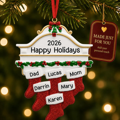 Red stockings family of 6 christmas ornament hanging on a lit Christmas tree with a Made Just For You gift tag