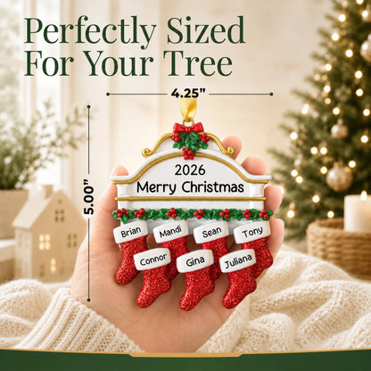 Size guide: the personalized red stockings family of 7 christmas ornament is 4.25 in wide by 5.00 in tall, shown in hand