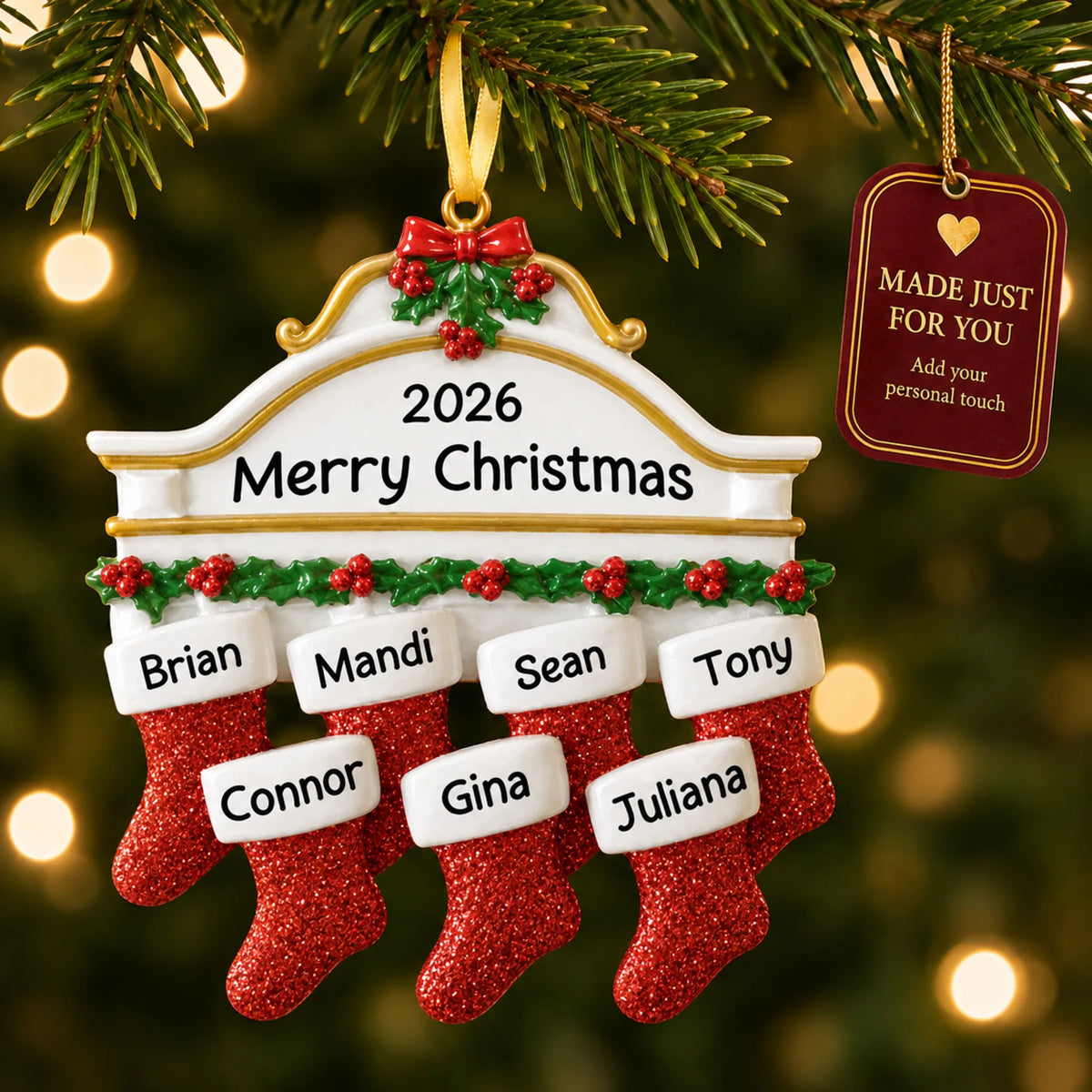 Red stockings family of 7 christmas ornament hanging on a lit Christmas tree with a Made Just For You gift tag