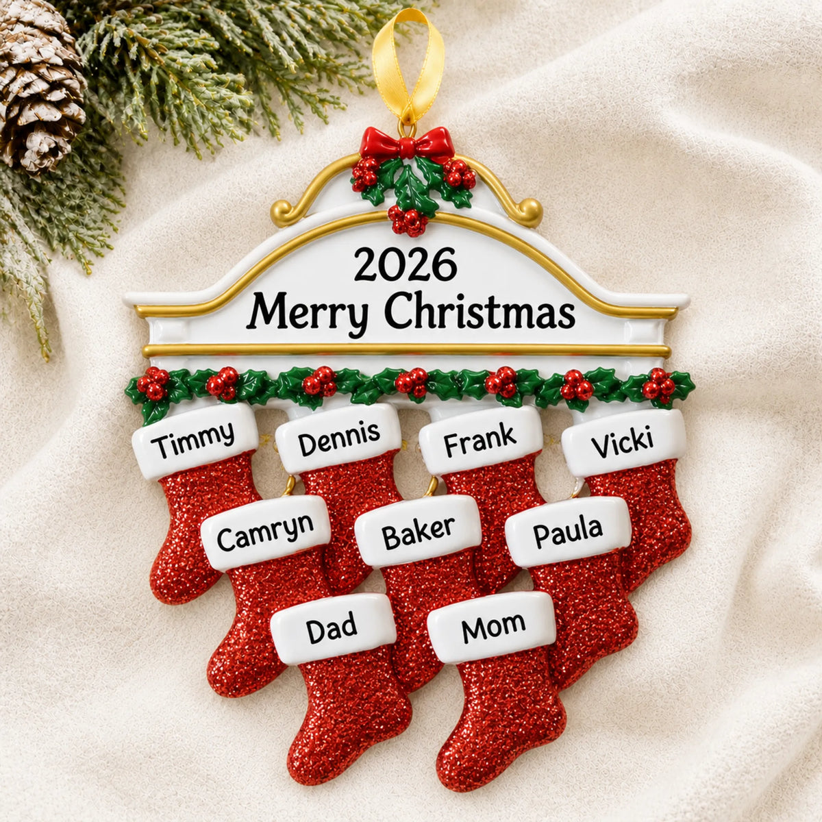Personalized red stockings family of 9 christmas ornament laid on a soft white knit blanket