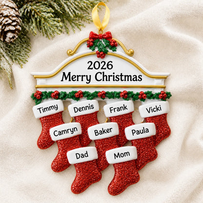 Personalized red stockings family of 9 christmas ornament laid on a soft white knit blanket