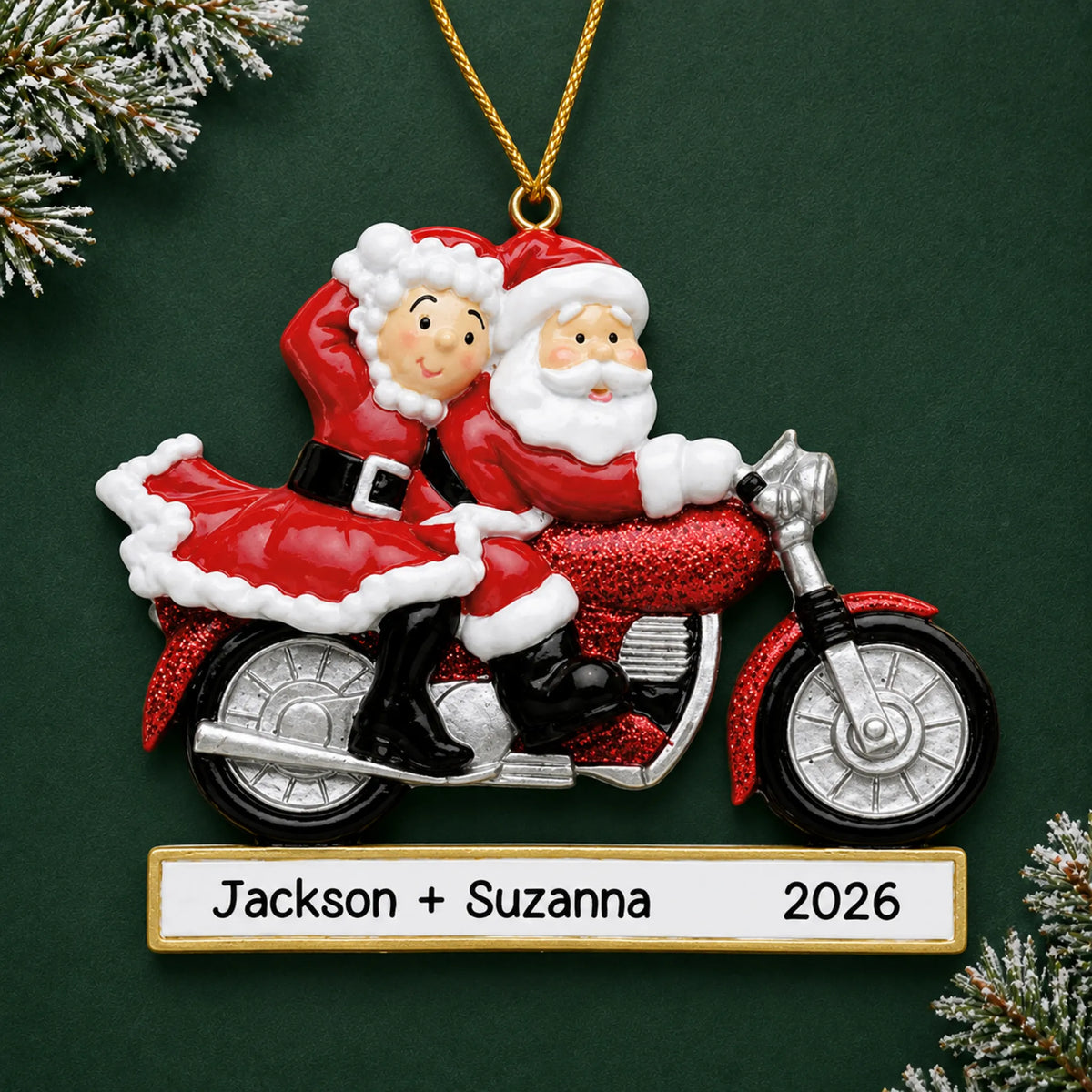 Personalized santa couple motorcycle christmas ornament on a dark green pine background