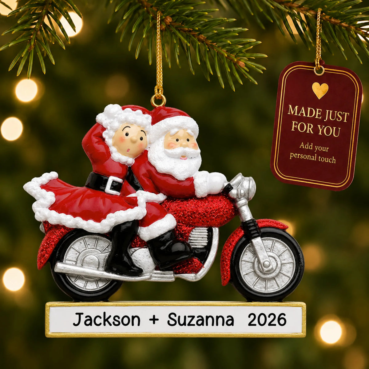 Santa couple motorcycle christmas ornament hanging on a lit Christmas tree with a Made Just For You gift tag