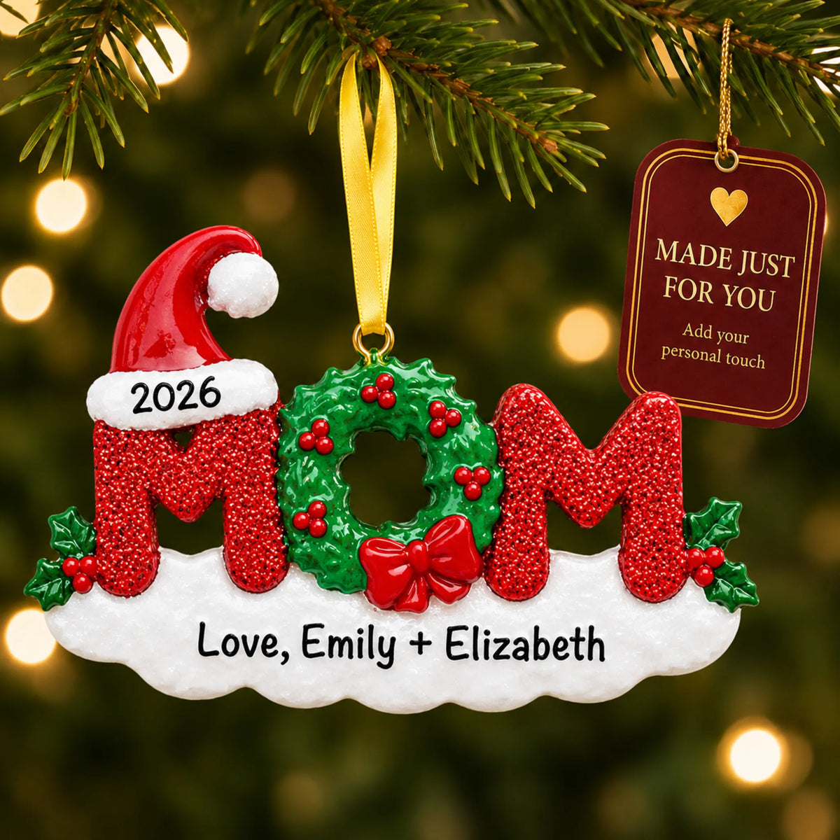 Mom christmas ornament hanging on a lit Christmas tree with a Made Just For You gift tag