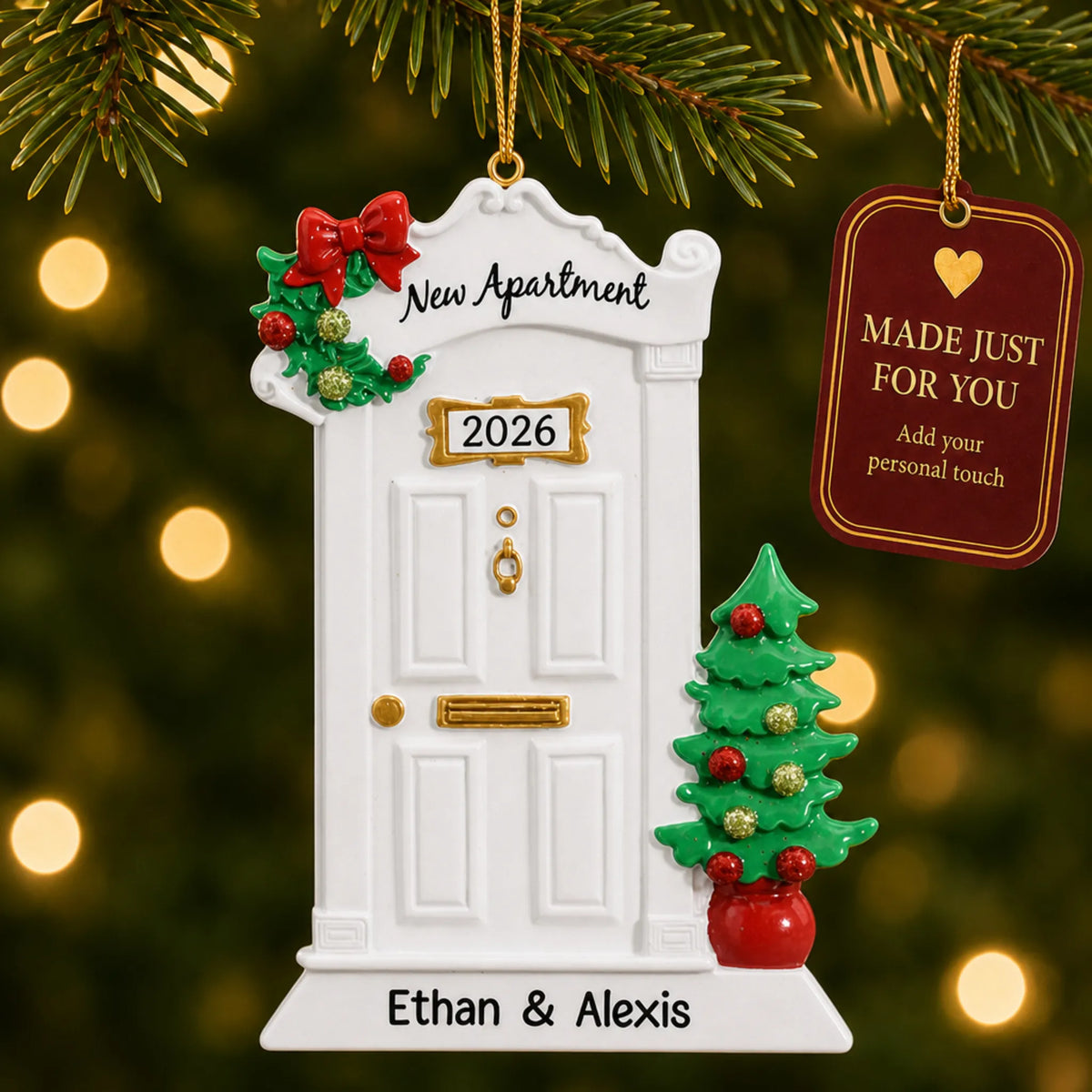 New Apartment christmas ornament hanging on a lit Christmas tree with a Made Just For You gift tag