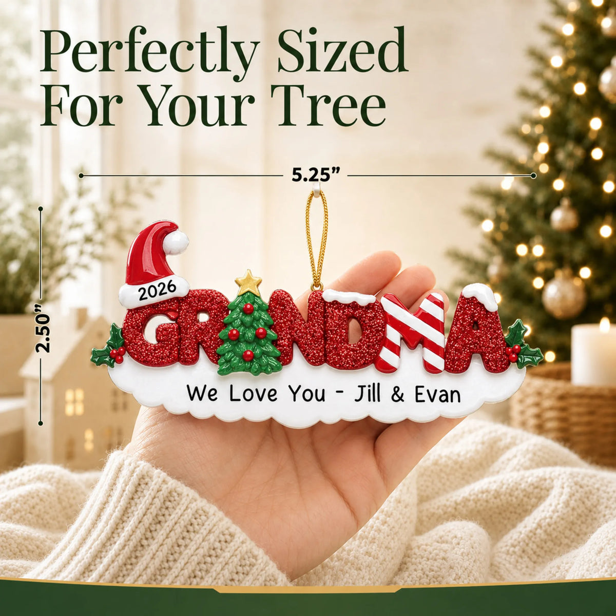 Size guide: the personalized grandma christmas ornament is 5.25 in wide by 2.50 in tall, shown in hand