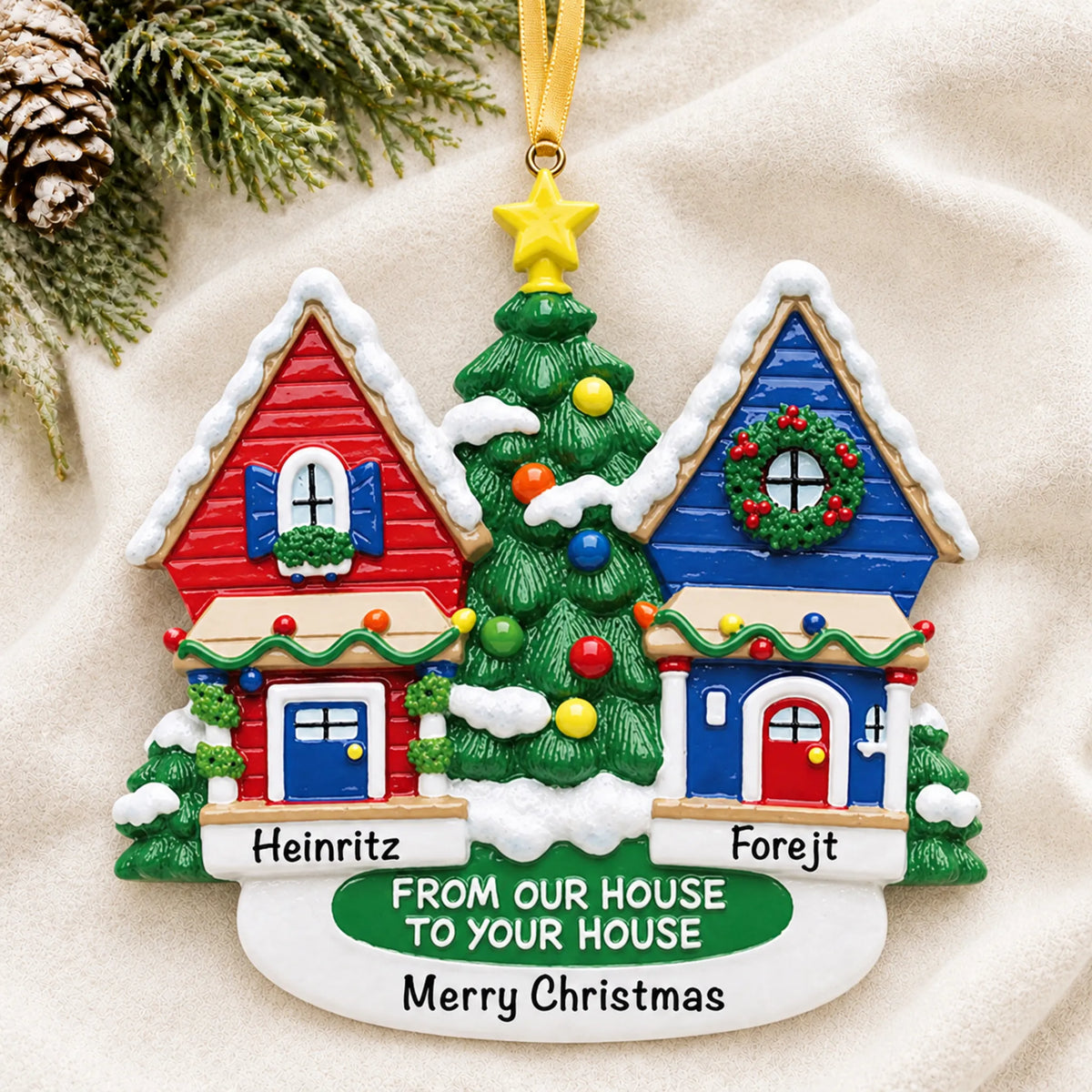 Personalized Neighbor House christmas ornament laid on a soft white knit blanket