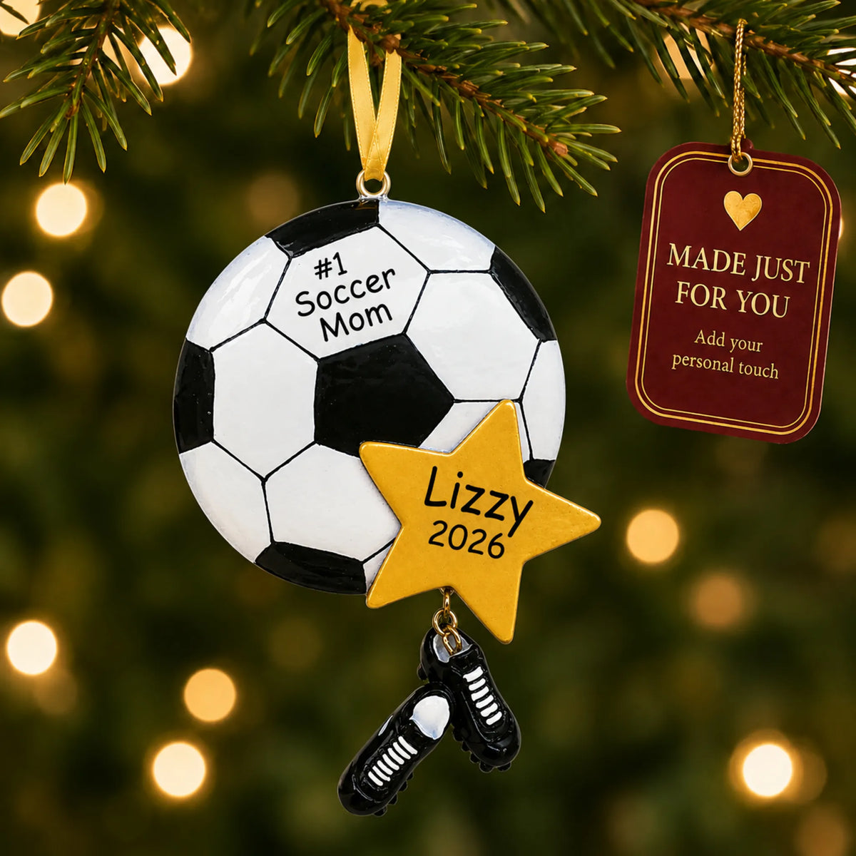 Soccer mom christmas ornament hanging on a lit Christmas tree with a Made Just For You gift tag